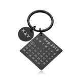 Porte-clés calendrier couple gravé de couleur noir