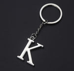Porte-clés couple lettre "K" argentée