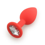 De plug rouge avec bijou cristal design