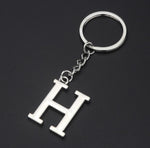 Porte-clés couple lettre "H" argentée